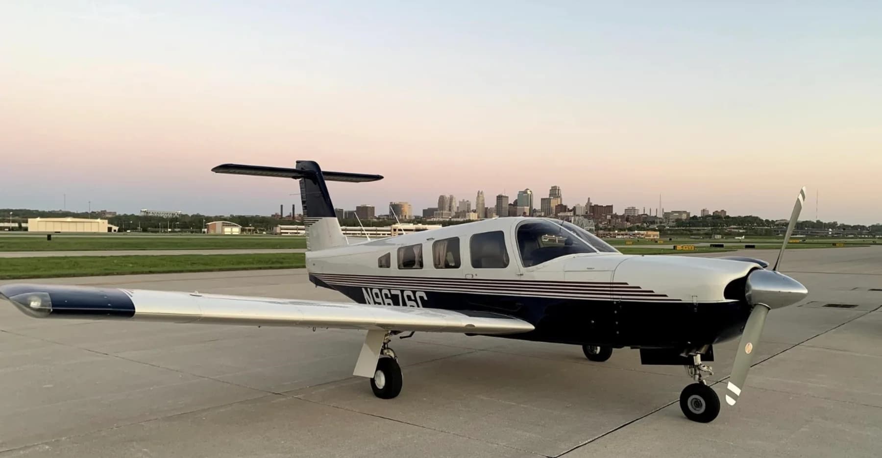 Private aircraft on the ramp at sunset